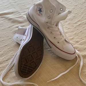 Converse All Star  Chuck Taylor white high tops.